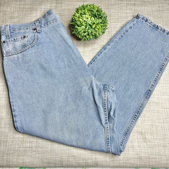 Vintage Made in USA Levi’s 560 loose fit, tapered leg jeans, light stonewash